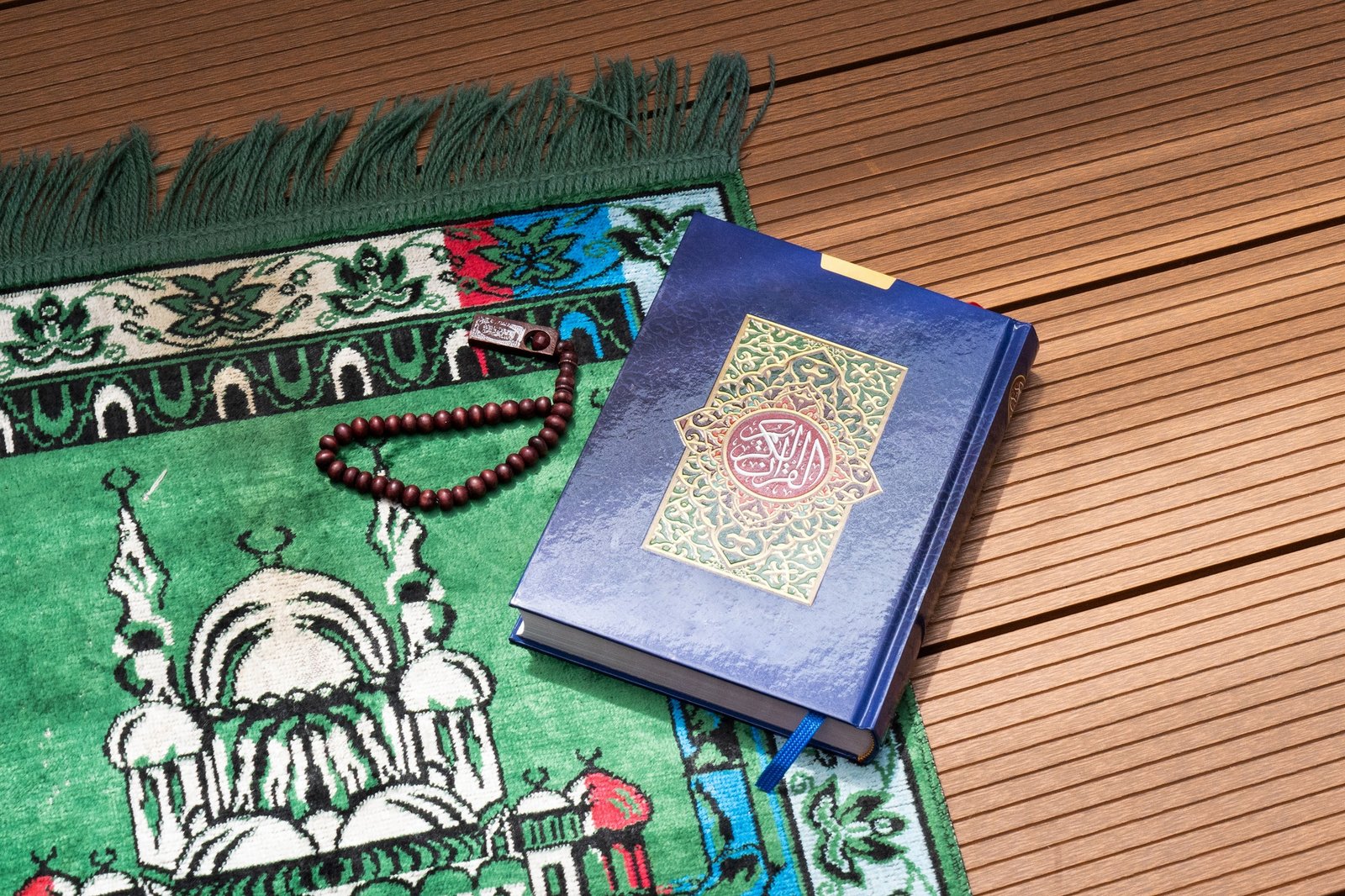 Holy Book Al Quran with Prayer Beads and Prayer Mat