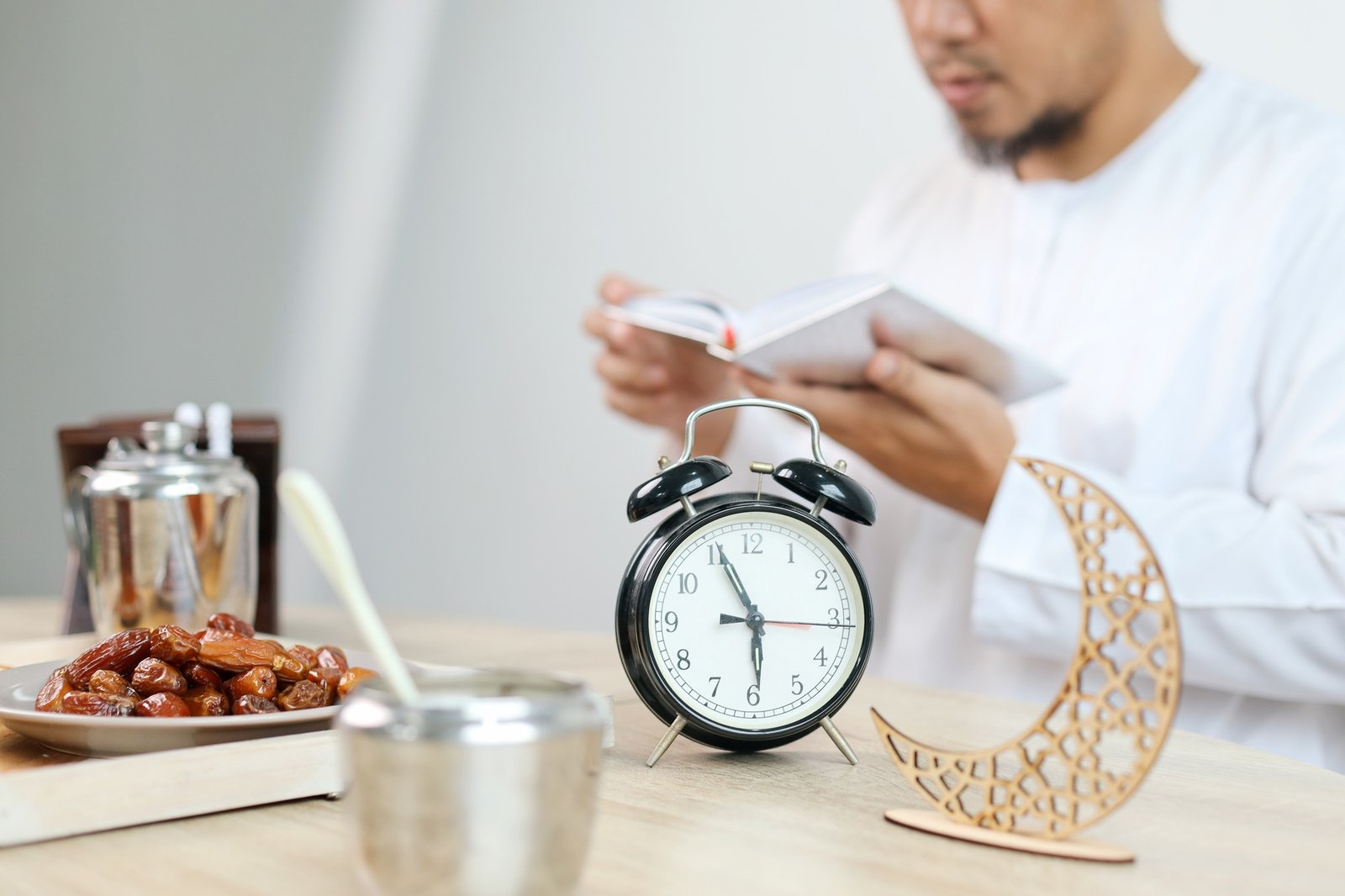 Man Reading Quran Before Iftar